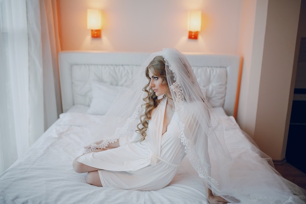 Free Photo Bride Posing On A Bed 9092