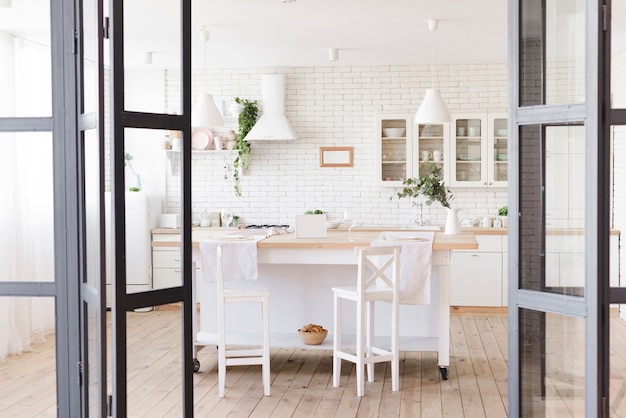 Premium Photo | Bright cosy modern kitchen with island