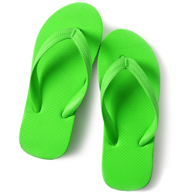 Free Photo | Bright green flip flop sandals isolated on white background