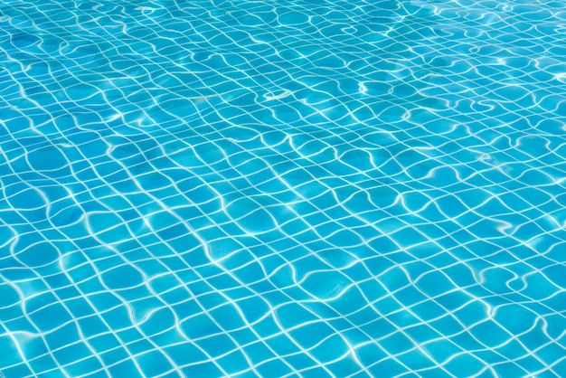 Premium Photo | Bright water surface and ripple wave in swimming pool ...