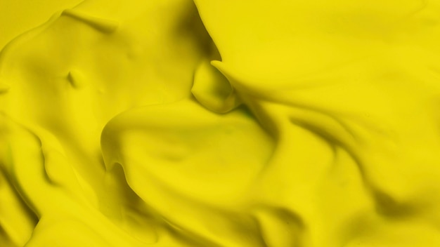 滑らかな質感の壁紙と明るい黄色の色の泡 無料の写真