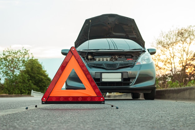 broken-down-car-on-the-road-premium-photo