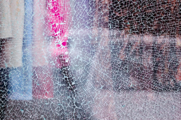 broken-glass-shop-window-clothing-store-with-unfocused-background_72928-291.jpg (626×416)