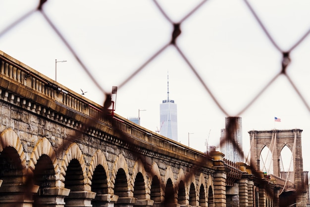 Brooklyn bridge and skyscrapers on skyline Free Photo