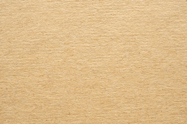 茶色のエコリサイクルクラフト紙テクスチャ段ボールの背景 プレミアム写真