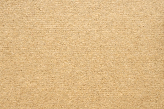 茶色のエコリサイクルクラフト紙テクスチャ段ボールの背景 プレミアム写真