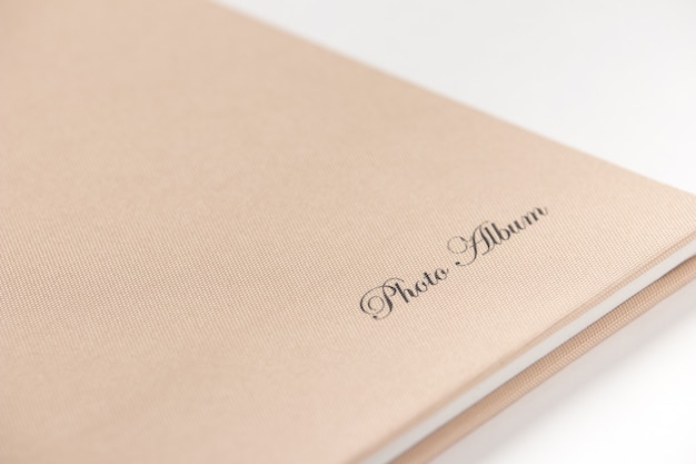 Premium Photo | Brown hardcover photo album on white background. close-up