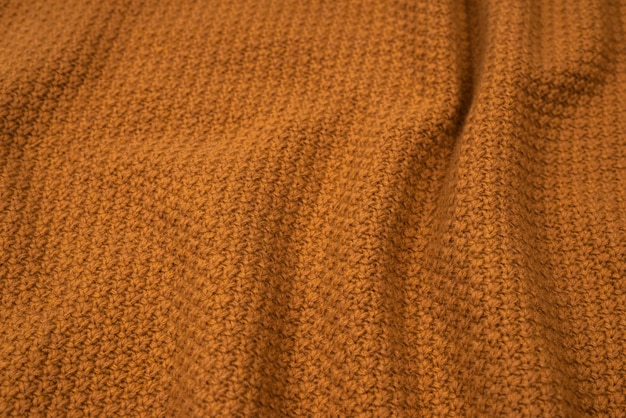 Premium Photo | Brown knitted fabric pattern.
