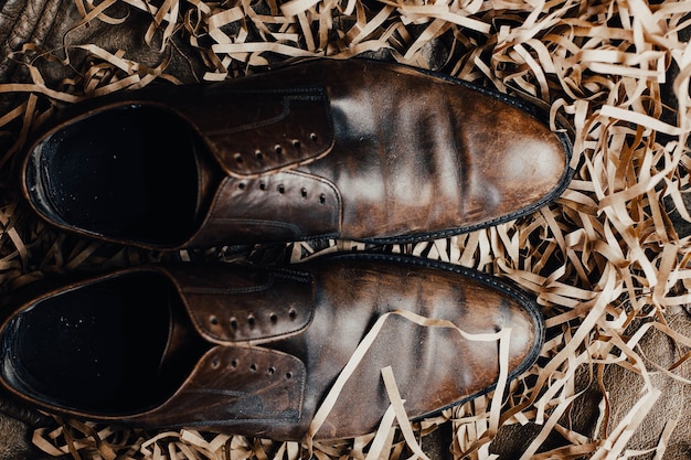 Premium Photo | Brown leather vintage shabby shoes