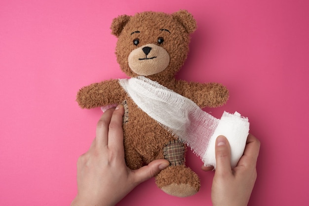 teddy bear with bandage on head