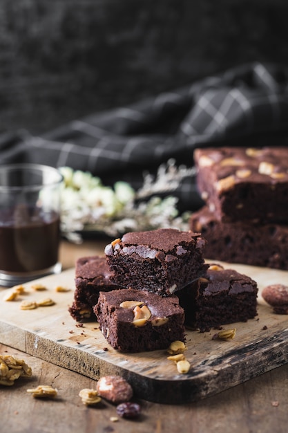 Premium Photo | Brownies on wooden table