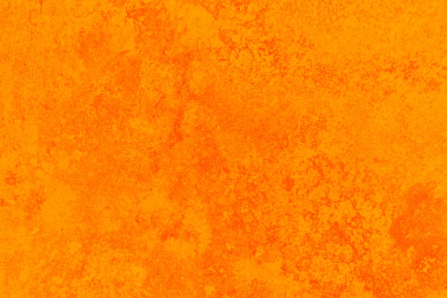 Brught orange texture of wall Free Photo