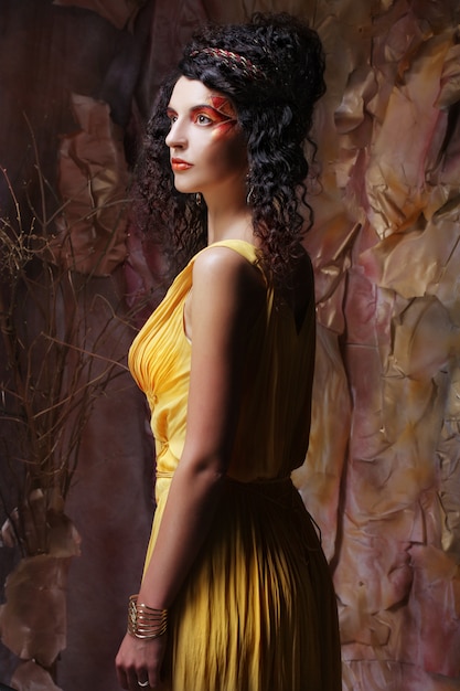 Premium Photo Brunette Woman Wearing Yellow Evening Dress