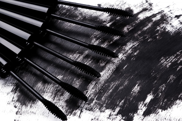 Premium Photo | Brushes and smudged mascara