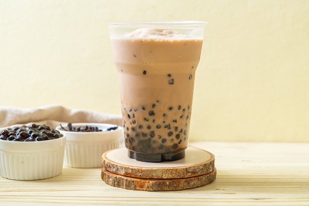 Bubble tea, also known as pearl milk tea, bubble milk tea, or boba ...