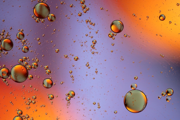 Bubbles world colorfull macro abstract in watter surface background Premium Photo