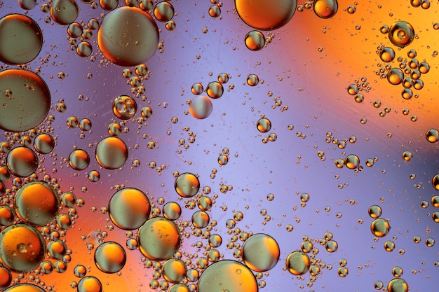 Bubbles world colorfull macro abstract in watter surface background Premium Photo