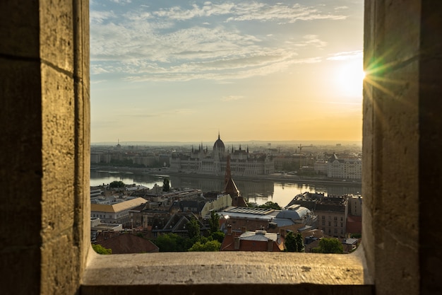 Budapest parliament building with view of danube river in hungary Premium Photo