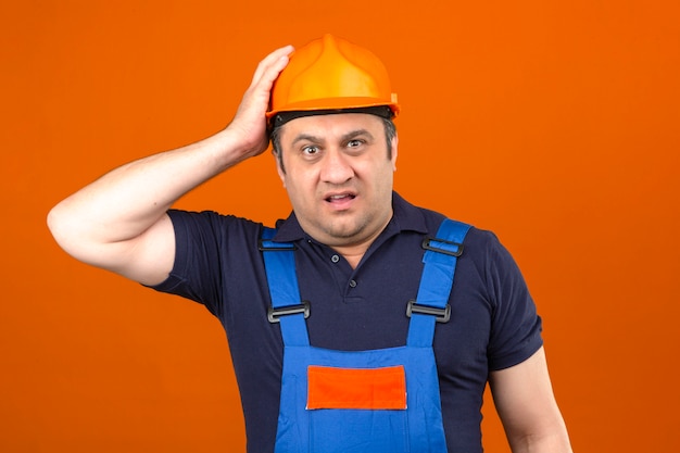 Free Photo | Builder man wearing construction uniform and safety helmet ...