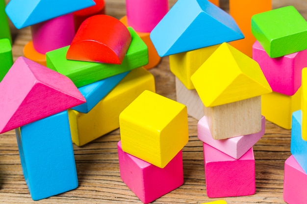 Building blocks on wooden background,Colorful wooden building blocks Free Photo Building blocks on wooden background,Colorful wooden building blocks Free Photo