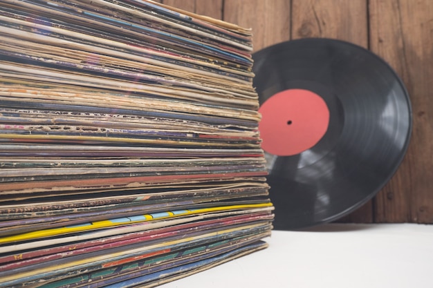 Premium Photo | A bunch of old vinyl records. retro music recording.