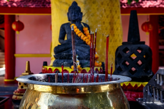 Premium Photo | Burning aromatic incense sticks. incense for praying ...