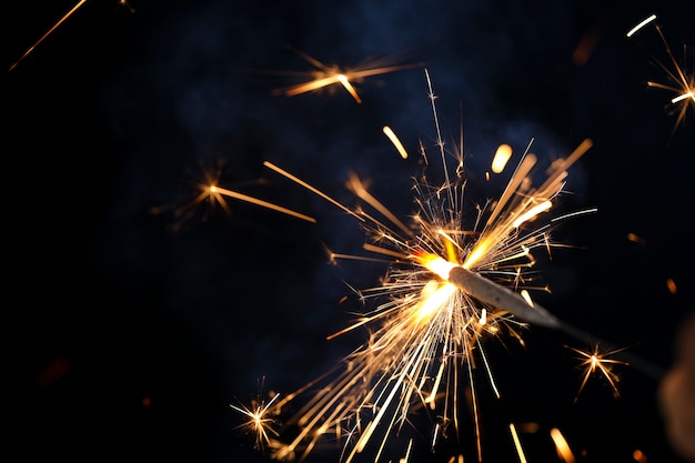 Premium Photo | The burning sparklers diwali festival. celebrating ...