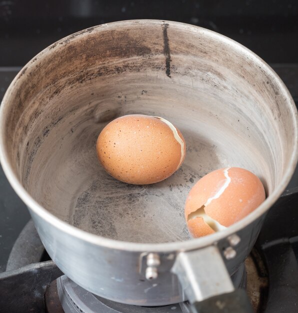 Premium Photo Burnt Hard Boiled Eggs In Pot The Eggs Burned By Boiling Until The Water Dries