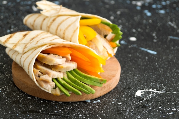 Premium Photo | Burrito with grilled chicken and vegetables (fajitas ...