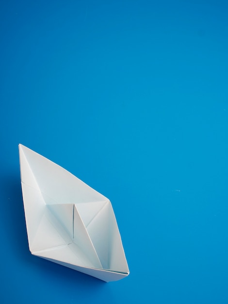 Business Concept Origami White Boat Paper Minimal On Blue