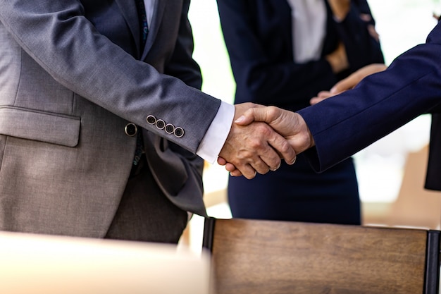 Premium Photo | Business deal handshake