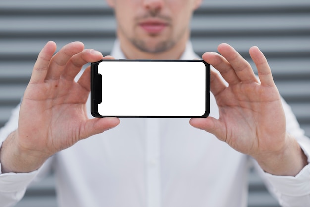 Download Business man holding iphone mock-up Photo | Free Download