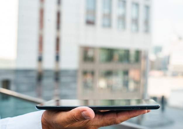 Free Photo | Business man holding tablet in hand