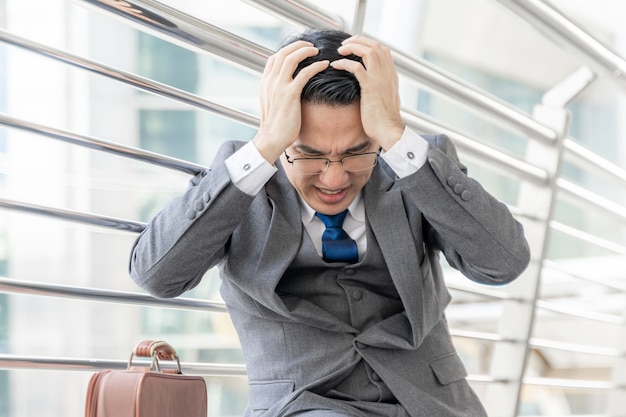 Business man is stressed from work , business concept Free Photo