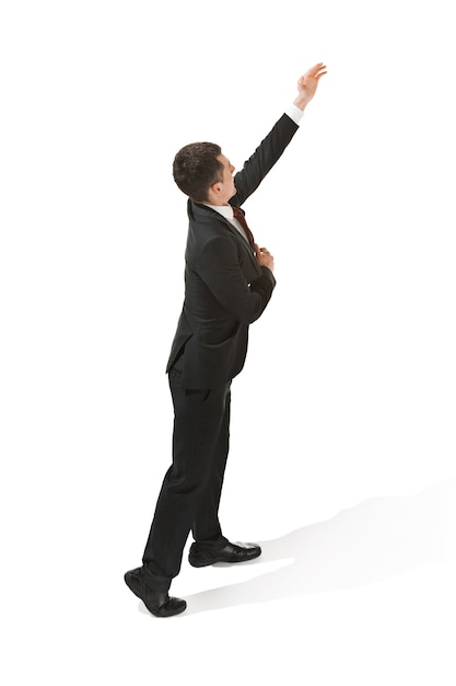 free-photo-business-man-trying-to-reach-something-on-white