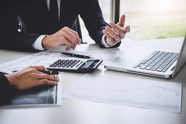 Business team investment working with computer and analysis graph stock market trading Premium Photo