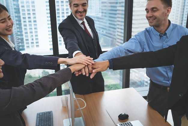 business people joining hands together