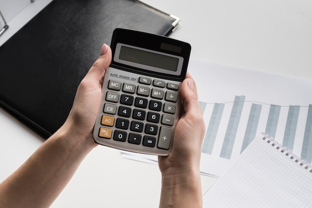 Free Photo | Business woman holding calculator