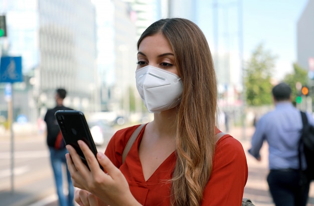 Download Free Business Woman Wearing Kn95 Ffp2 Face Mask Walking In Modern City Use our free logo maker to create a logo and build your brand. Put your logo on business cards, promotional products, or your website for brand visibility.