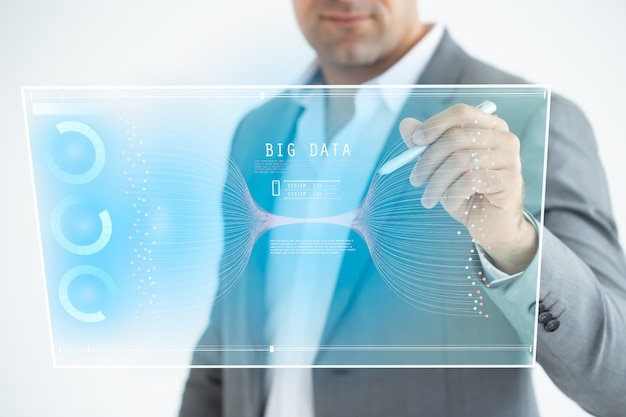 Businessman analysis on digital screen, technological digital futuristic virtual interface, business strategy and big data. Premium Photo