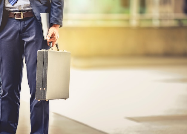 carrying a briefcase