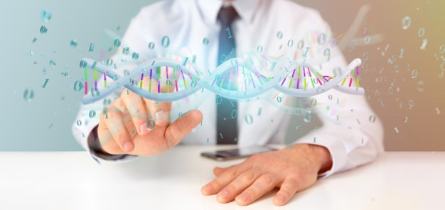 Businessman holding a 3d rendering data coded dna with binary file around Premium Photo