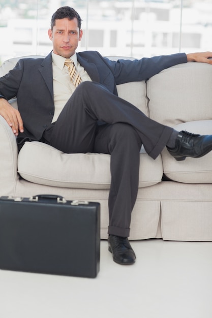 Businessman Sitting With Legs Crossed On The Couch Photo Premium Download   Businessman Sitting With Legs Crossed On The Couch 13339 155760 