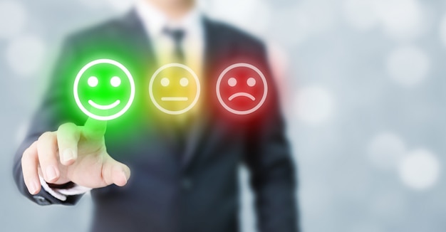 Businessmen choose to rating score happy icons. customer service experience and business satisfactio