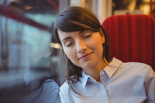 Premium Photo | Businesswoman sleeping while travelling