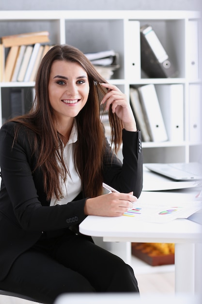 Premium Photo | Businesswoman in the workplace in the office portrait