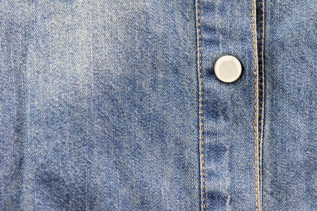 Premium Photo | Buttons on jeans background