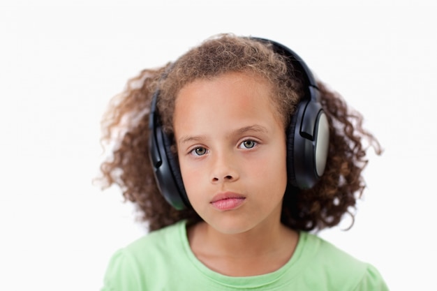 Premium Photo | Calm girl listening to music