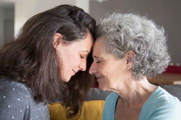 Calm senior mother and daughter supporting each other Free Photo