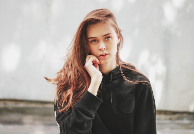 beautiful girl in black hoodie